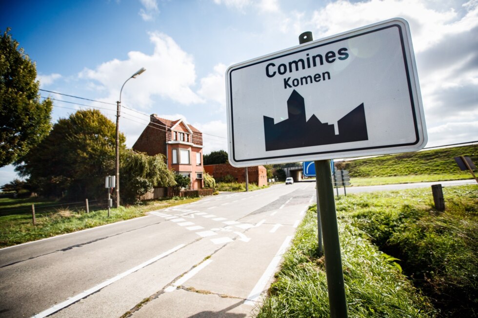 Komen straatbord belga